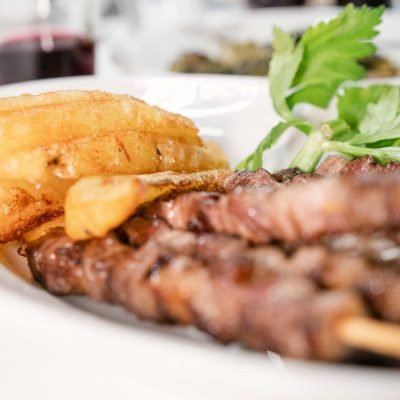 Arrosticini con patate rustiche